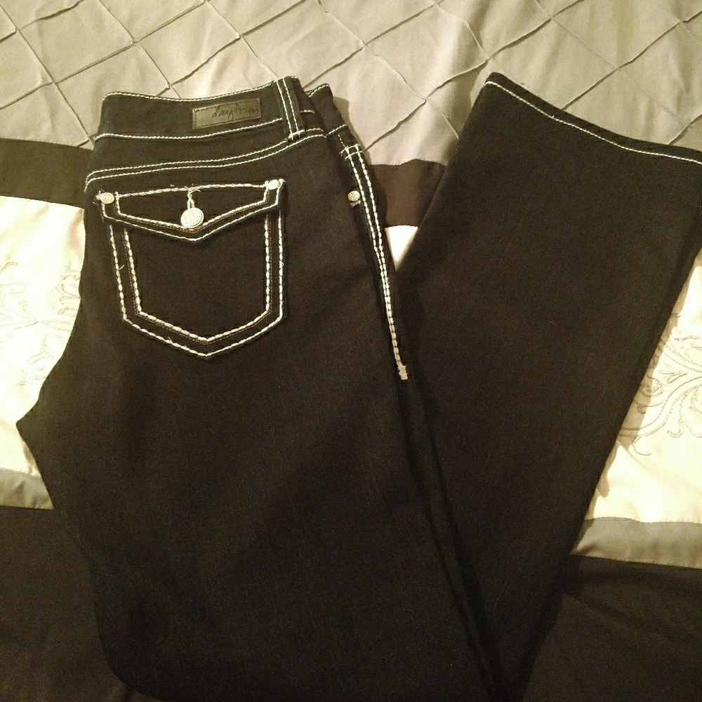 Buckle day-trip jeans. Size 31 regular.